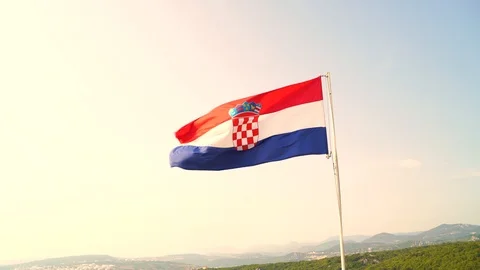 Image of Croatian flag waving at the wind during sunset. Stock Footage 118086905