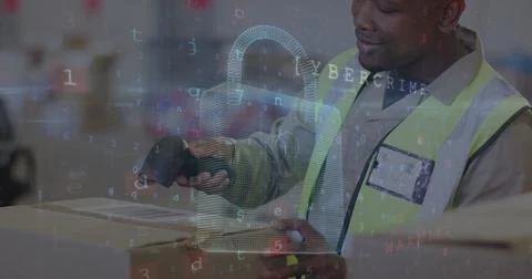 Image of cyber attack text and data processing over biracial man working in Foto stock