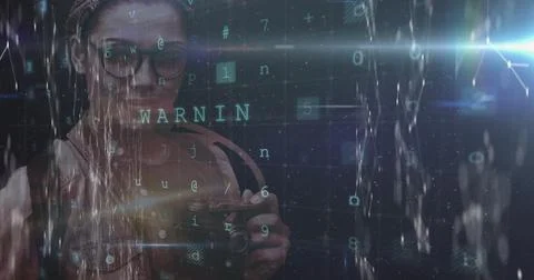 Image of cyber attack warning and data processing over female photographer Stock Photos