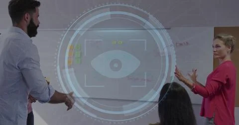 Image of cyber security text and retina scanner over diverse colleagues Stock Photos