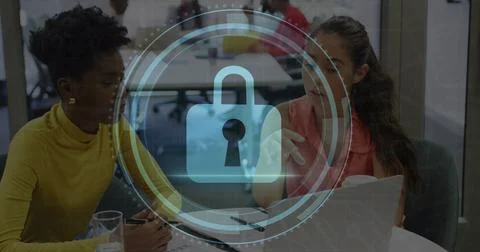 Image of cyber security text, lock icon, diverse female coworkers planning .. Foto stock