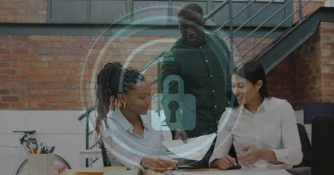Image of cyber security text, security padlock icon over diverse colleagues 스톡 사진