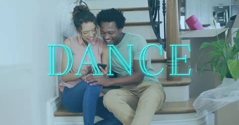 Image of dance text over diverse couple using smartphone Fotos Stock