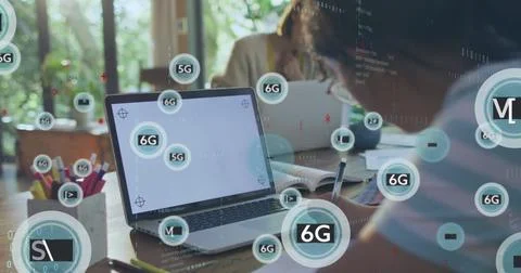 Image of data processing, 6g icons over caucasian girl writing by laptop at desk Stockfoto's