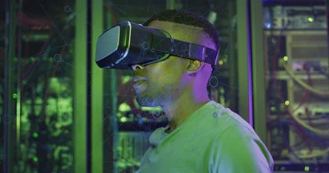 Image of data processing, african american male it engineer in vr goggles and Stock Photos