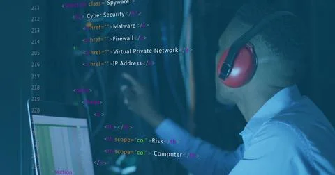 Image of data processing against african american male engineer using laptop at Stock Photos