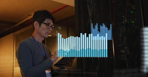 Image of data processing against asian male engineer working in computer server Stockfoto's
