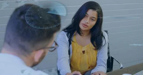 Image of data processing against diverse man and woman discussing over a do.. Stockfoto's