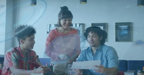 Image of data processing against diverse colleagues discussing over documents at 库存照片