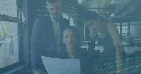 Image of data processing against diverse businesspeople discussing over document Foto stock