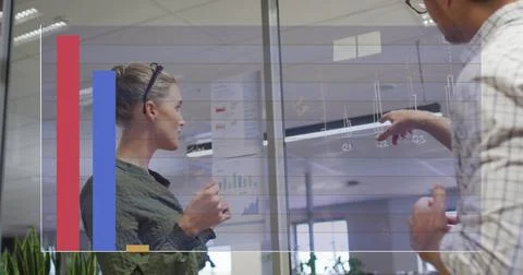 Image of data processing against diverse man and woman discussing over memo Stock Photos