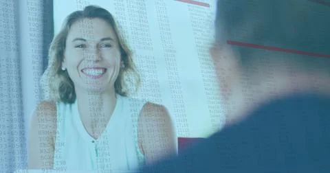 Image of data processing against portrait of caucasian woman smiling at offic 写真素材