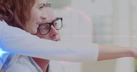 Image of data processing and blue light over caucasian business people in office 写真素材