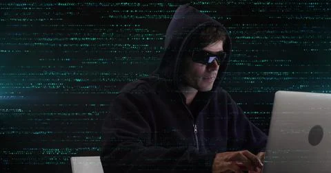 Image of data processing and caucasian male hacker over black background Foto stock