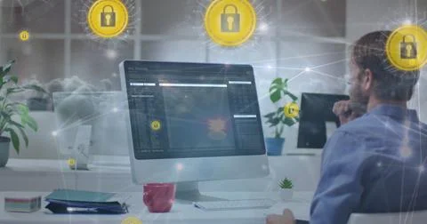 Image of data processing and clouds over caucasian businessman using computer Foto stock