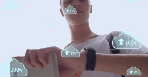 Image of data processing and clouds over caucasian man using smartphone Foto stock