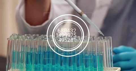 Image of data processing and diagram over biracial female doctor taking sample Foto stock