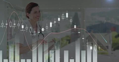 Image of data processing and diagrams over caucasian female doctor using tablet Foto stock