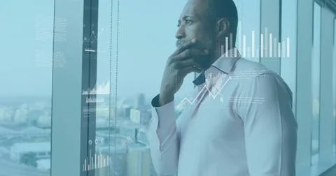 Image of data processing and diagrams over african american businessman thinking Foto stock