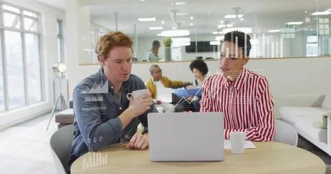 Image of data processing and diagrams over caucasian colleagues discussing work Stockfoto's