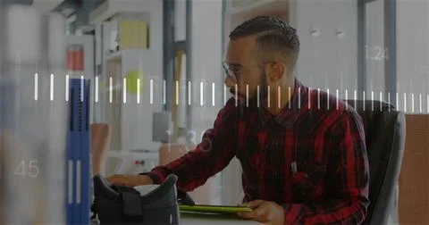 Image of data processing and diagrams over biracial man using tablet Foto stock