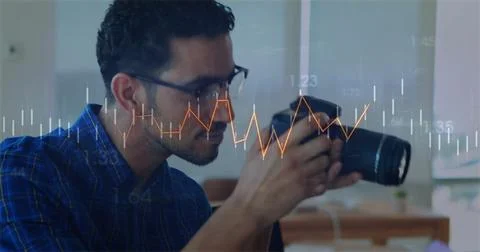 Image of data processing and diagrams over biracial man taking photo in office Foto stock