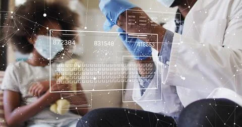 Image of data processing and diagrams over biracial male doctor examining his Foto stock
