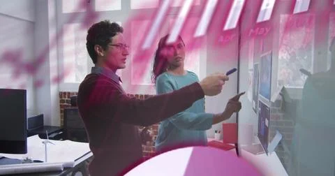 Image of data processing and diagrams over diverse colleagues discussing work in 스톡 사진