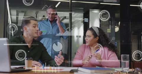 Image of data processing and diagrams over diverse colleagues discussing work in Stockfoto's