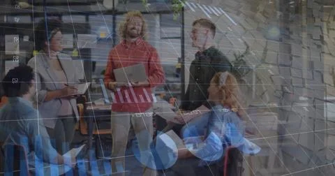 Image of data processing and diagrams over diverse colleagues discussing work Stock Photos