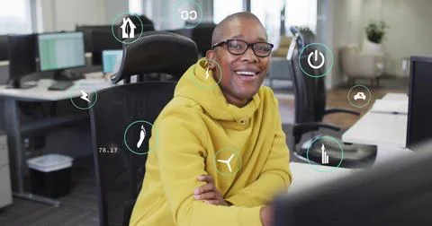 Image of data processing and ecology icons over diverse colleagues working .. Foto stock