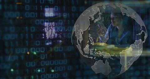 Image of data processing and globe over african american female server room 写真素材