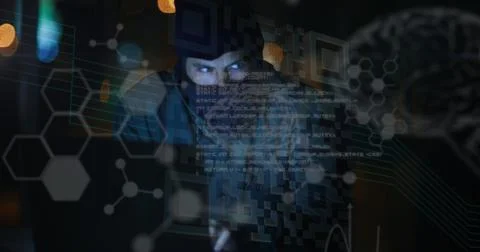 Image of data processing and glowing brain over hacker using computer Foto stock