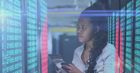 Image of data processing and lights over african american woman working in Stockfoto's