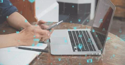 Image of data processing and networks over man using smartphone and laptop Foto stock