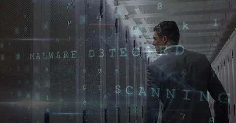 Image of data processing and padlock icon over caucasian businessman in server 库存照片