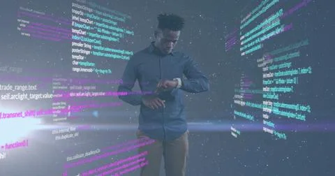 Image of data processing and spotlight over african american man using Foto stock