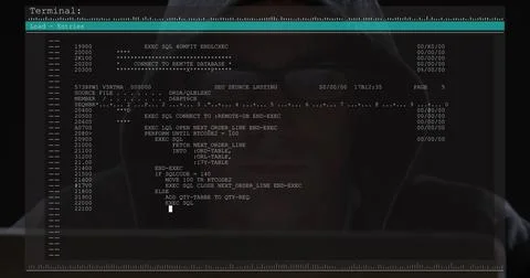 Image of data processing on computer screen over male hacker using computer 库存照片