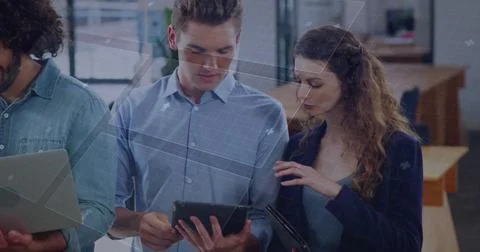 Image of data processing on digital screen over diverse female and male Stock Photos