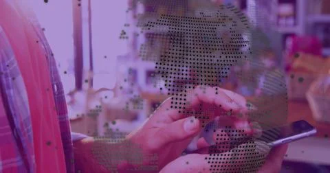 Image of data processing with globe over caucasian man using smartphone 库存照片