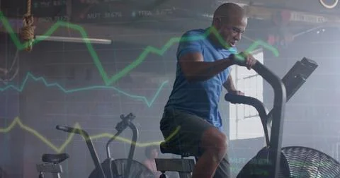 Image of data processing on graph over african american man cross training on Stock Photos