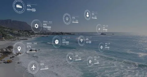 Image of data processing with icons over seaside landscape 库存照片