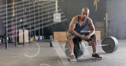 Image of data processing on interface over biracial man sitting on barbell Foto stock