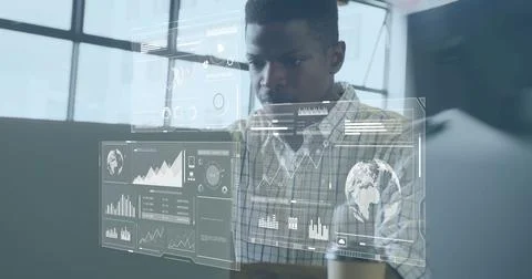 Image of data processing o interface screens over african american man using Foto stock