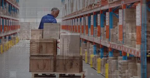 Image of data processing one man working in warehouse Stock Photos