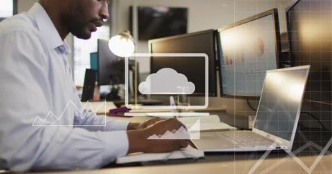 Image of data processing over african american businessman using computer in 写真素材