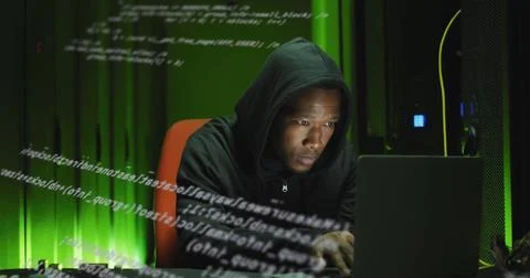 Image of data processing over african american man working on laptop in server Stock Photos