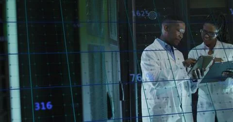 Image of data processing over african american man and woman working in server Stock Photos