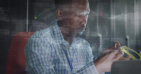 Image of data processing over african american male worker in server room 写真素材