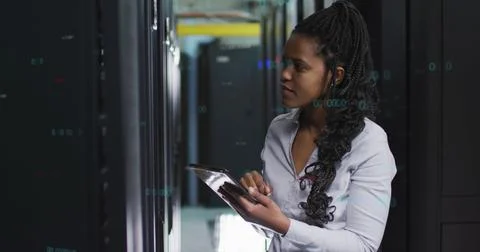 Image of data processing over african american female it engineer and computer Foto stock